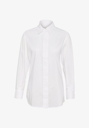 Valkoinen nappikauluspaita pitkillä hihoilla, klassinen kaulus ja suora leikkaus. Valmistettu sileästä kankaasta, jossa on puhdas ja yksinkertainen muotoilu.