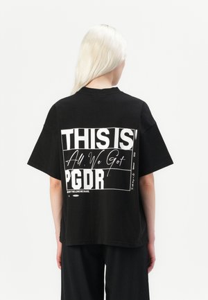 JANNA OVERSIZED TEE - Print T-shirt - washed black