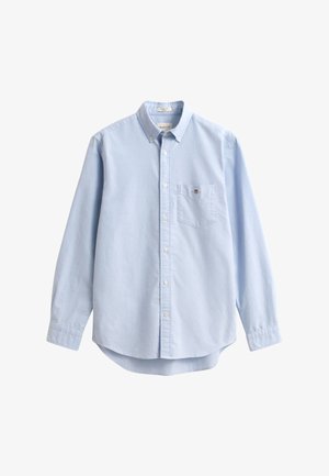 Light blue button-up shirt made of cotton. Features a chest pocket, long sleeves, and a classic collar. Smooth texture with a rounded hem.