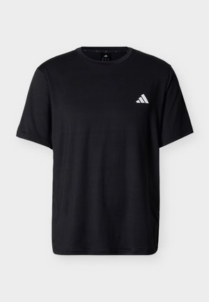 Čierne tričko s krátkym rukávom a okrúhlym výstrihom, s malým bielym logom Adidas na ľavej hrudnej časti, zobrazené na jednoduchom svetlom pozadí.