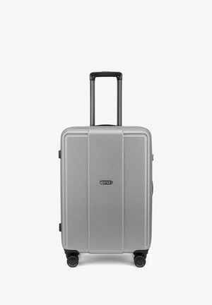 Silver hard-shell suitcase with telescopic handle extended and four spinner wheels, branded "Epic" on front center.