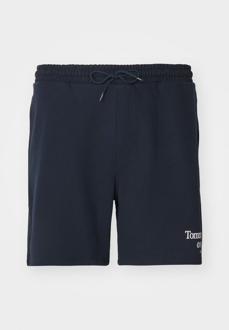 Navy blue athletic shorts made of soft material, featuring an elastic waistband with a drawstring and a logo on the lower side.