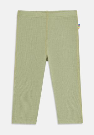 Lichtgroene geribde gebreide peuterleggings met elastische tailleband en een klein meerkleurig gestreept label aan de zijkant.