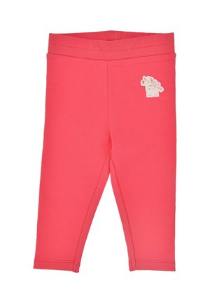 Leggings corail en rose, fabriqués dans un matériau doux. Ils présentent une taille élastique confortable et un petit patch de licorne pastel sur le côté gauche.