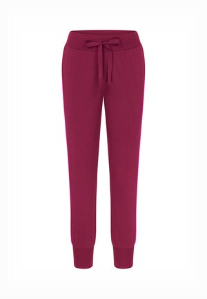 Fleece-Jogginghose in tiefem Magenta mit dehnbarem Bund, verstellbarem Kordelzug und eng anliegenden Bündchen an den Knöcheln. Glatte Textur.