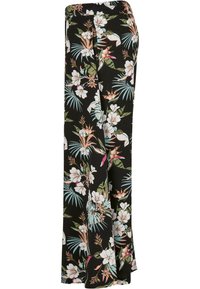 Blomstrete palazzo-bukser med svart bakgrunn, hvite og rosa blomster, tropiske blader, og en avslappet passform med elastisk midje.