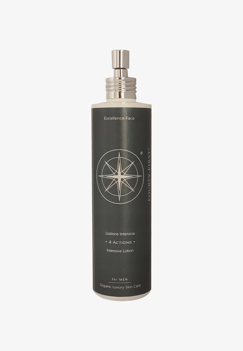 Bottiglia cilindrica nera con accenti argentati, etichettata "Excellence Face" e "Intensive Lotion." Presenta un design a forma di bussola al centro.