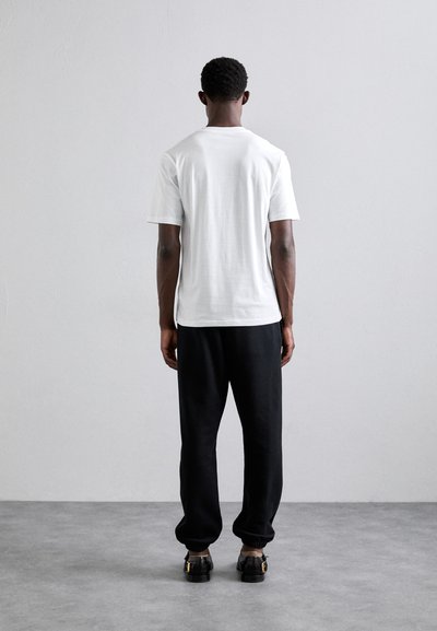 MOSCHINO Trükipildiga T-särk - fantasia bianco