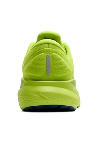 Scarpa sportiva di un verde brillante, con tomaia testurizzata, colletto imbottito e accenti riflettenti. Suola spessa con design ammortizzato.