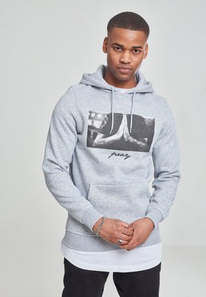 Gray hoodie with a front graphic print of hands in a prayer position. Features a front pocket, drawstring hood, and ribbed cuffs.