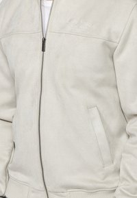 Koroshi Bomber tipa jaka - piedra   stone