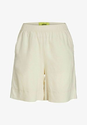 Bermudas de longitud a la rodilla en color beige claro, confeccionadas con una tela texturizada. Incluyen una cinturilla elástica y bolsillos laterales para mayor funcionalidad.