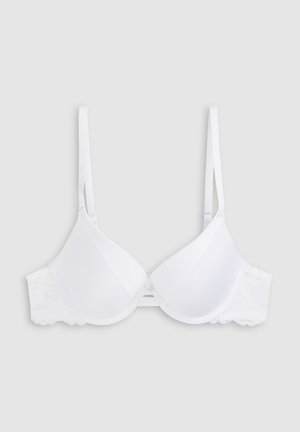 Soutien-gorge blanc rembourré avec bretelles ajustables, détails en dentelle sur les côtés et une finition en tissu lisse. Présente un design classique avec armatures.