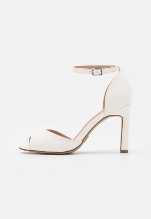 Højhælede pumps - white