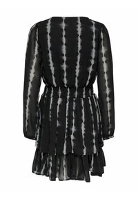Schwarz- und graues Batik Kleid mit ein gerafftem Taillenbereich, langen Ärmeln und einem mehrlagigen Rock. Leichte, durchsichtige Stoffe mit einem fließenden Design.