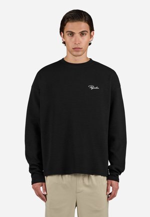Black long-sleeve sweatshirt with a textured waffle knit design, crew neckline, and subtle white logo on the left chest.
