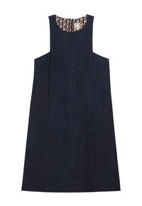 Robe sans manches en denim bleu foncé. Elle possède un col rond avec une doublure colorée à motifs et une poche à l'avant. Design simple en A.