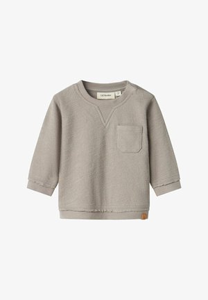 Maglietta a maniche lunghe grigia chiara con scollo a V, dotata di tasca frontale e polsini a costine. Il tessuto ha una finitura strutturata.