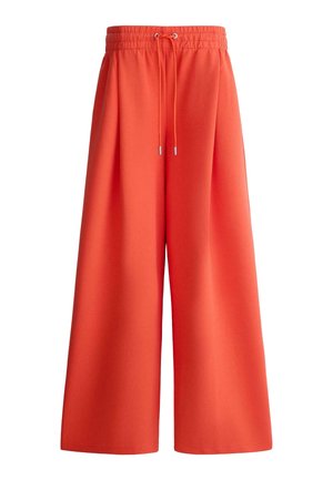 Weit geschnittene orangefarbene Hose mit elastischem Bund und Kordelzug, aus glattem Stoff gefertigt, für eine lockere, bequeme Passform entworfen.