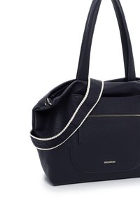 Navy blue leather handbag with textured surface, dual handles, and a removable strap. Features a front zip pocket and a logo detail.