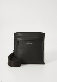 Calvin Klein MUST FLATPACK  - Cross body bag - black