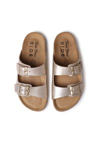 Metallic guld sandaler med två justerbara spännen, formad fotbädd och övre i konstläder på en brun texturerad sula. Storlek 37.