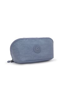 Pochette cosmetica in nylon blu con forma arrotondata, chiusura a zip e logo circolare impresso sul fronte. Texture liscia e design leggero.