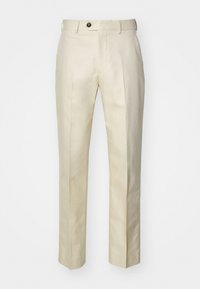 Beige skräddarsydda byxor i lätt tyg. De har raka ben, fickor framtill och knäppning med knapp.