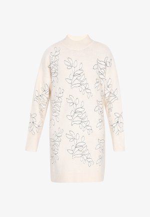 Suéter crema con cuello alto, con bordado de hojas negras en un patrón repetido. Mangas largas y tejido de punto texturizado.