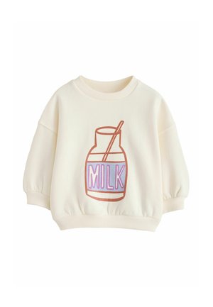 Langærmet sweatshirt i flødefarve med tegneserie-stil mælkeflaske og sugerør grafik og ordet "MILK" i lilla på fronten.