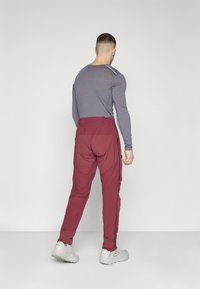 Norrøna FJØRÅ PANTS - Biciklističke hlače - tawny port