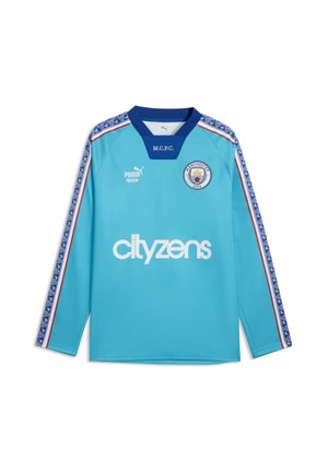 Lyseblå Manchester City langærmet fodboldtrøje med mørkeblå mønstrede skulderstriber, klublogo, Puma-logo og "cityzens" sponsor tekst.