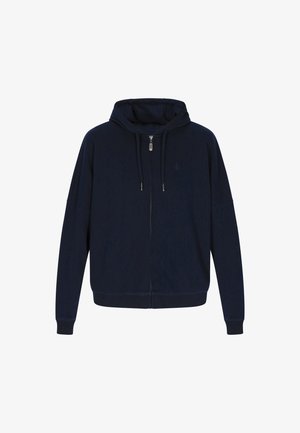 Tengerészkék, cipzáras kapucnis pulóver, puha anyagból készült. Állítható kapucnival, elülső zsebekkel és bordázott mandzsettával rendelkezik. Diszkrét logó a mellkason.