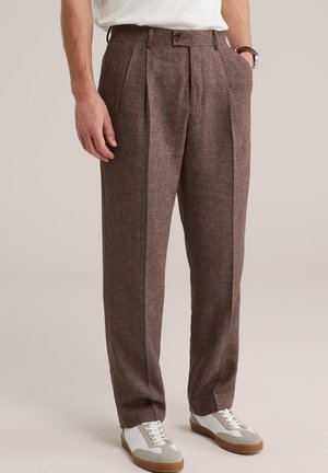 - Spodnie materiałowe