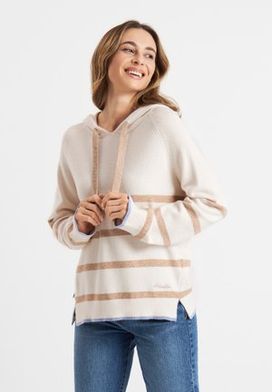 Crème-kleurige hoodie met lichtbruine strepen, geribbelde manchetten en een geborduurd logo. De stof lijkt zacht en gestructureerd, met een zijspleet.