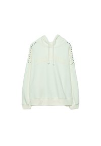 Sweat à capuche crème clair avec un texte "heartbreaker" à l'avant, orné d'accents cloutés sur les épaules et une capuche à cordon. Texture de tissu douce.