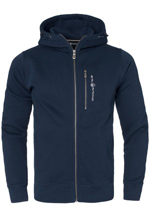 Marinblå zip-up hoodie med framdragkedja och huva med dragsko. Har texturerad tyg och en broderad logotyp på bröstet.