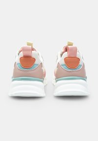 Sport sneakers with a white mesh upper, pink and blue accents, and a textured beige heel panel. Features a padded collar and pull tab.