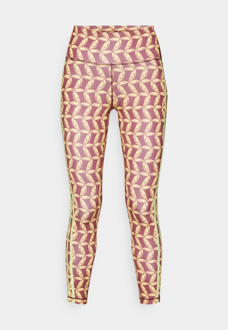 Leggings con un design a motivi di forme gialle su uno sfondo bordeaux, con strisce laterali verdi e una vita alta.