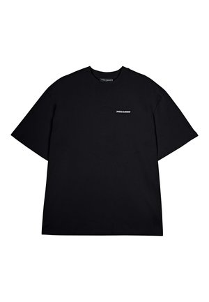 Black cotton t-shirt with short sleeves. Features a small white "PEGA DOR" logo on the left chest area. Simple and unadorned design.
