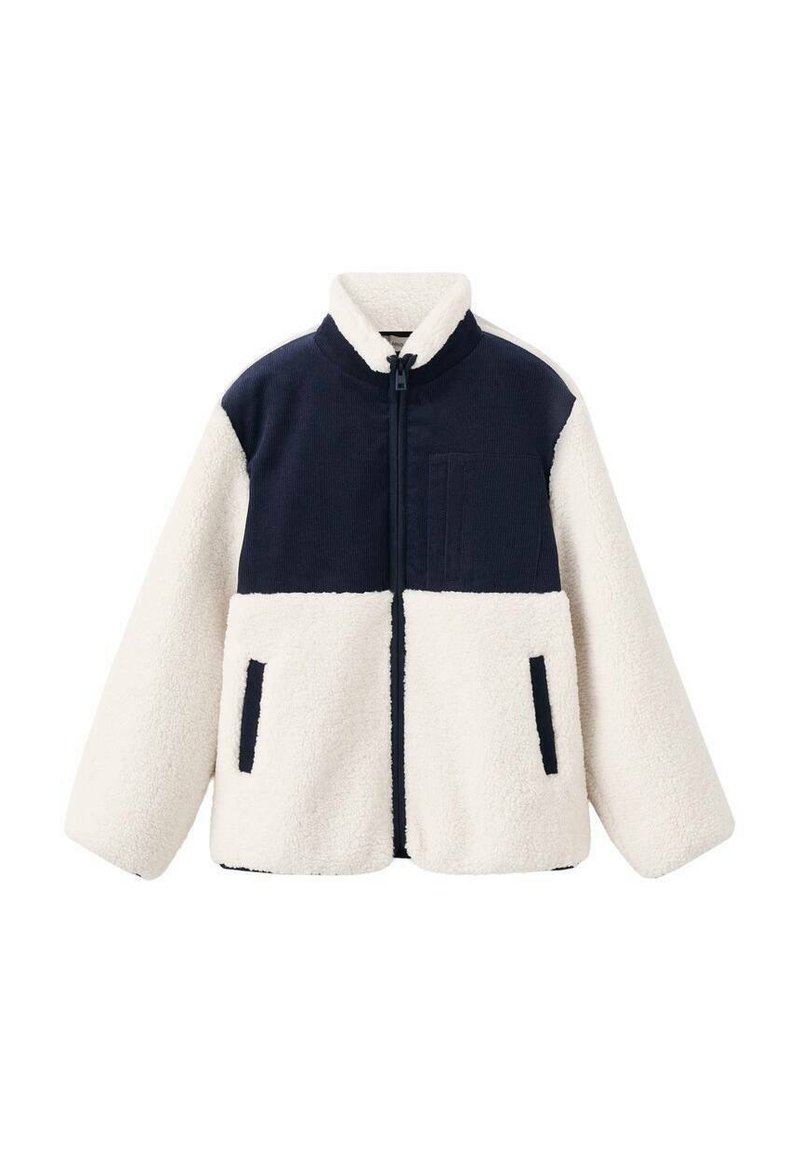 Veste en polaire avec une partie supérieure bleu marine et une partie inférieure crème. Elle possède un col montant, une fermeture éclair sur le devant et des poches latérales. Texture douce.