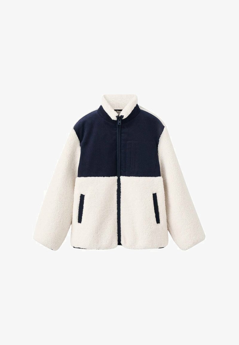 Flis jakna z modrim zgornjim delom in kremnim spodnjim delom. Ima stoječ ovratnik, sprednji zadrgo in stranske žepe. Mehka tekstura.