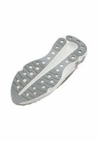 Suela de zapato con un diseño de goma texturizado en gris y blanco, que presenta patrones circulares elevados y una ranura de flexión central para mayor flexibilidad.