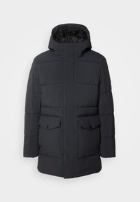 Puffer jacket in dark navy, featuring a hood, horizontal quilted design, two front patch pockets with flaps, and a zip closure.