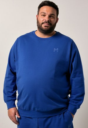 Felpa in cotone blu con collo tondo, polsini e orlo a costine, caratterizzata da un logo impresso discreto sul petto. Tessuto liscio.