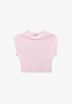 Light pink cropped t-shirt made from soft cotton. Features a round neckline and short sleeves with a relaxed fit.