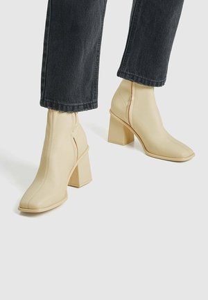 High heeled ankle boots - nude