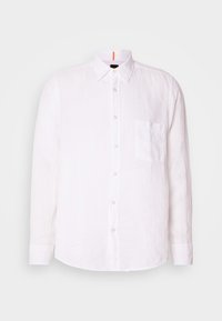 Camisa blanca de lino abotonada con un bolsillo frontal, cuello puntiagudo y mangas largas. Presenta una textura sutil, corte ajustado y dobladillo recto.