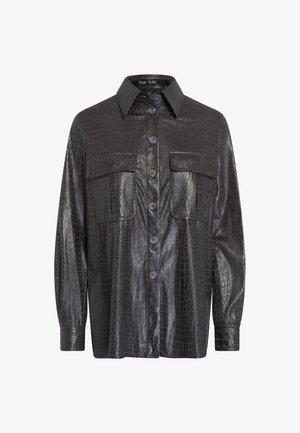 Black faux leather shirt with a crocodile texture, featuring a collar, button front, two chest pockets, and long sleeves.