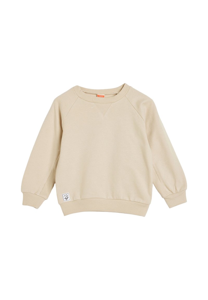 Sudadera de algodón beige con puños y dobladillo acanalados, que presenta un escote redondeado y una pequeña etiqueta gráfica en la parte inferior izquierda.